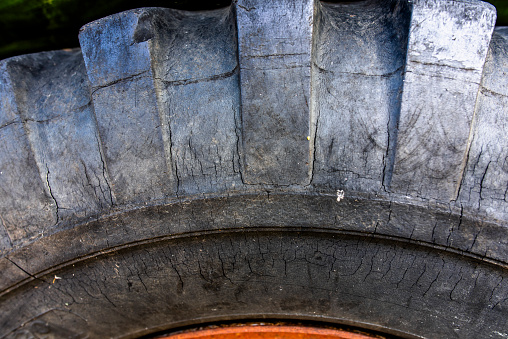 close up of an old tire cracked by time in Mossano Vicenza Veneto Italy