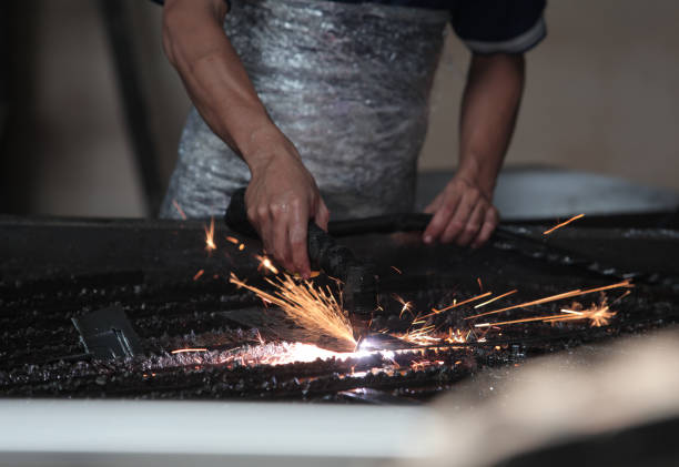 istock Cutting metal plate with a laser. 1501397893