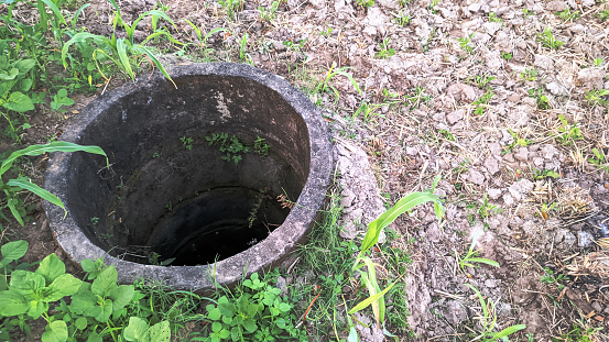 An old well in the middle of a rice field as a means of irrigation in the dry season