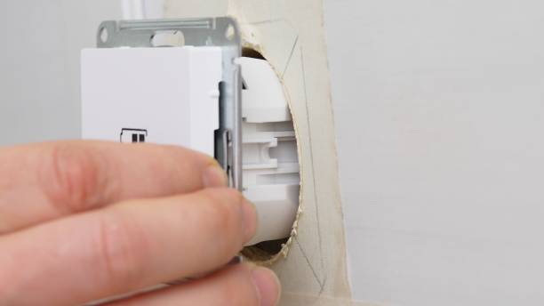 istock Installation of a USB Type-C socket at the head of the bed for charging devices. 1501450652