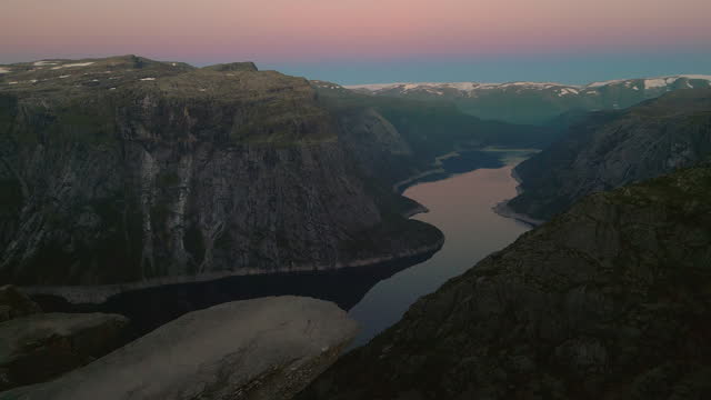 Drone Aerial: Breathtaking view of Trolltunga rock Norway