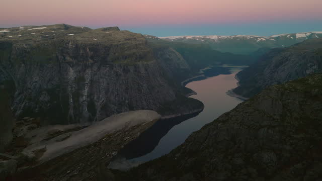 Drone Aerial: Breathtaking view of Trolltunga rock Norway