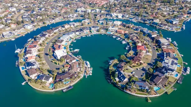 Aerial drone view above Sylvania Waters in the Sutherland Shire, Sydney, NSW Australia on a sunny day in June 2023