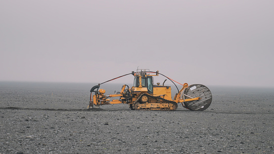 Tractor close up view in the mist