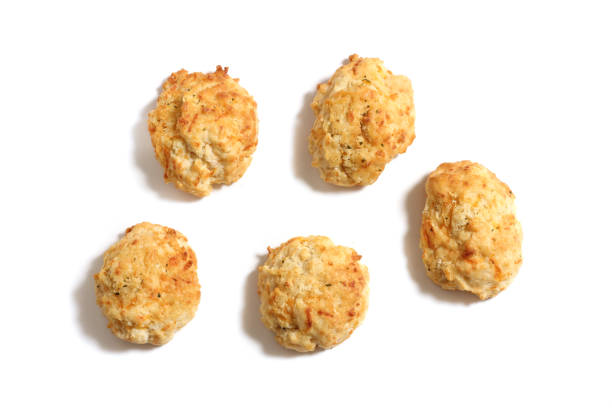 istock Garlic and Cheddar Biscuits Isolated on White Background 1501475844