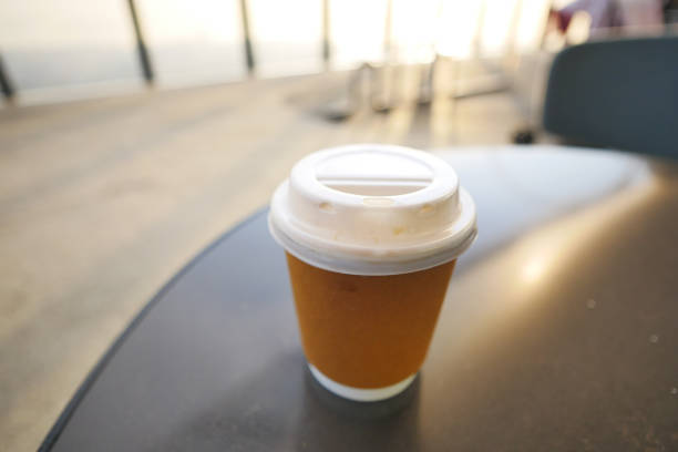 istock take away paper coffee cup o on cafe table 1501479278
