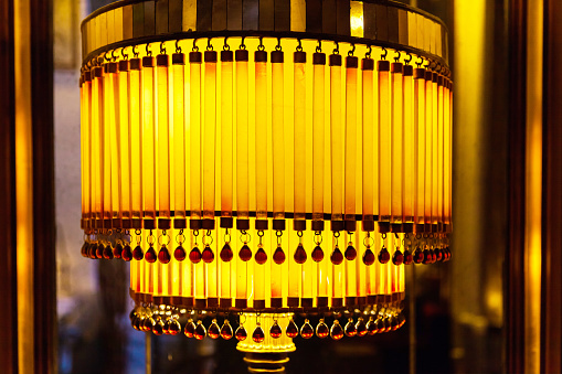 Antique crystal lampshade of a table lamp, close-up.