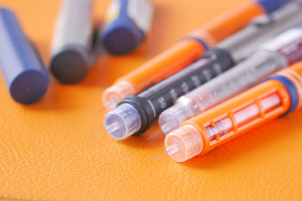 istock many Insulin pens on orange color background 1501484116