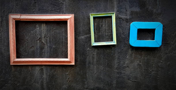 istock Colorful empty picture frame hanging or isolated on black rough black wall for decoration festival, event or wedding party. 1501495004