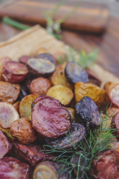 istock multi-colored baked potatoes on parchment close-up 1501495694