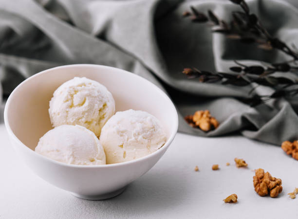 istock Vanilla ice cream balls with walnut 1501545525