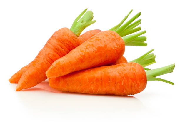 istock Fresh carrots isolated on white background 1501547770