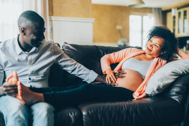 istock Husband massaging his wife's feet 1501584432