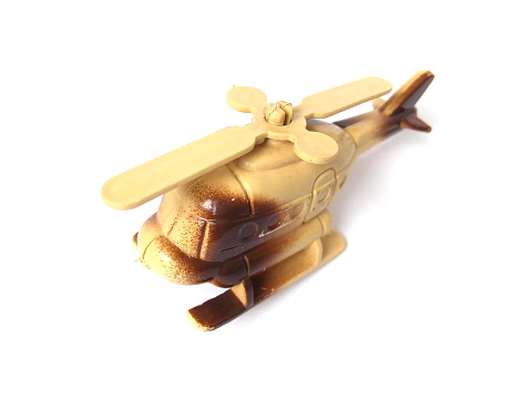 Close up of brown color plastic toy, kids toy.