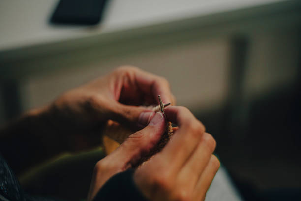 istock Woman knitting 1501631578