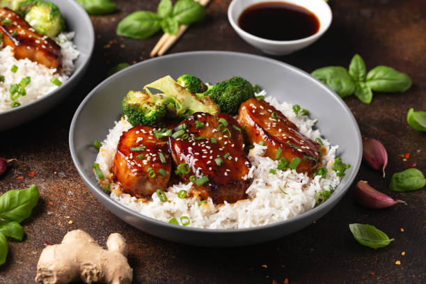 istock Teriyaki Pork Belly with broccoli, spring onion and rice 1501640071