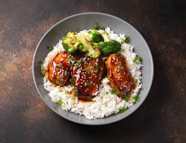 istock Teriyaki Pork Belly with broccoli, spring onion and rice 1501640585