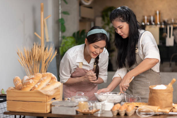 istock From Kitchen to Virtual Bakery: Asian Woman's Online Delights 1501659676