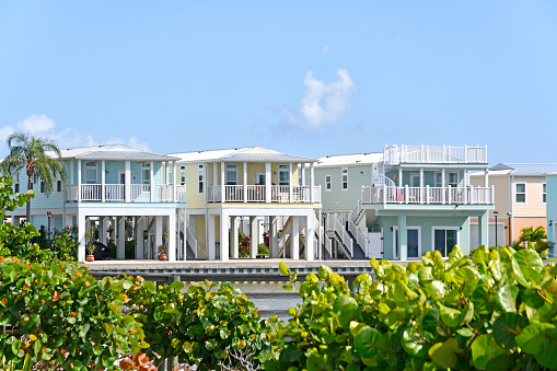 Vacation home rentals on stilts along the St Lucie river coastline near Jensen Beach in Martin County, Florida