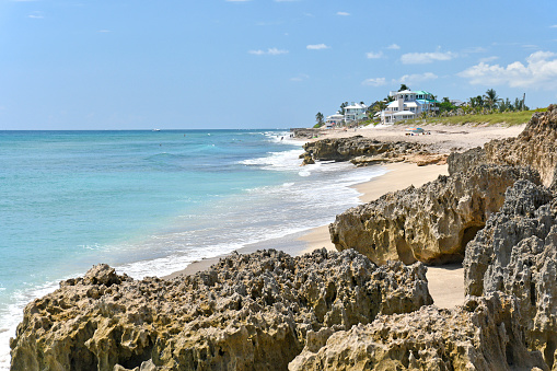 Rocky coastline with blue ocean view at Stuart Rocks Beach on Hutchinson Island - Stuart, Martin County, Florida