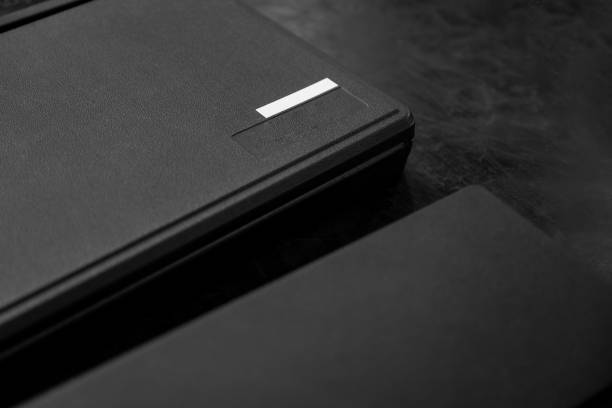 notepad with leaves, pages produced naturally with recycled materials, on a red background
