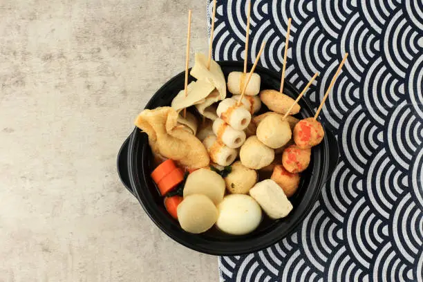 Japanese Oden. Vegetables, Fish Dumplings, and Various Other food, Stewed in a Thin Soy Dashi Stock Soup. Copy Space for Text