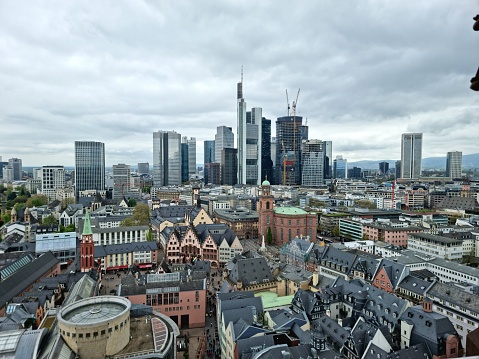 Frankfurt am Main panoramic view over the financial district. The image was captured on a cloudy day during spring season.