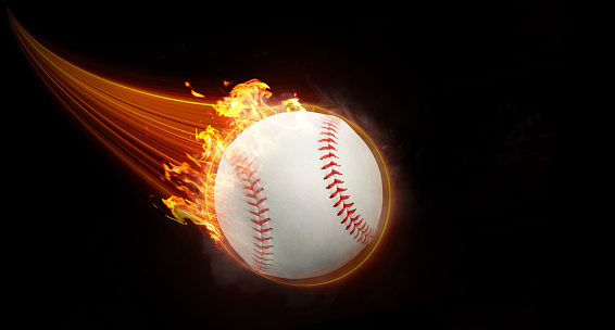 Baseball ball fly with magic effect swiftly in black background orange flame.