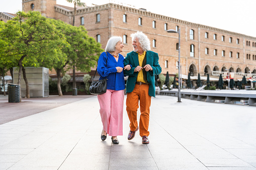 Senior couple having fun strolling in the city.