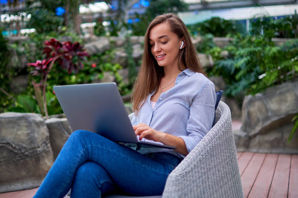 istock Modern smart freelancer woman remotely working online at a laptop 1501719183