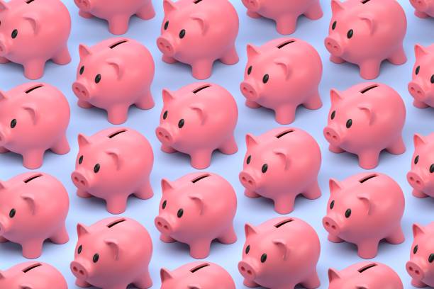istock Piggy banks lined up in rows 1501721384