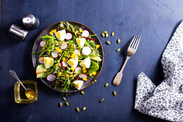 istock Spring green salad with egg, radish and onion 1501721980