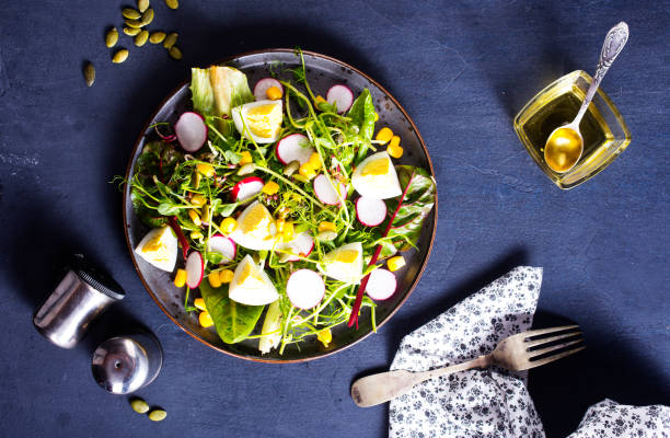 istock Spring green salad with egg, radish and onion 1501721984