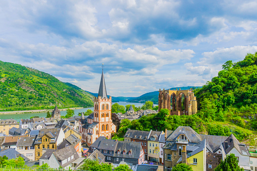 Boat and industrial ship on Rhine river - aerial view