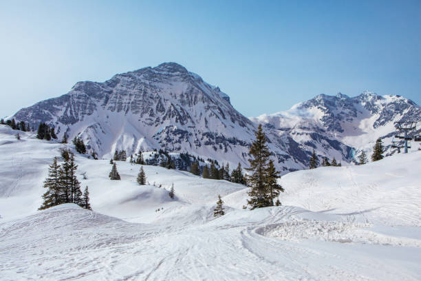 Beautiful Austrian mountainous countryside landscape view in the snow