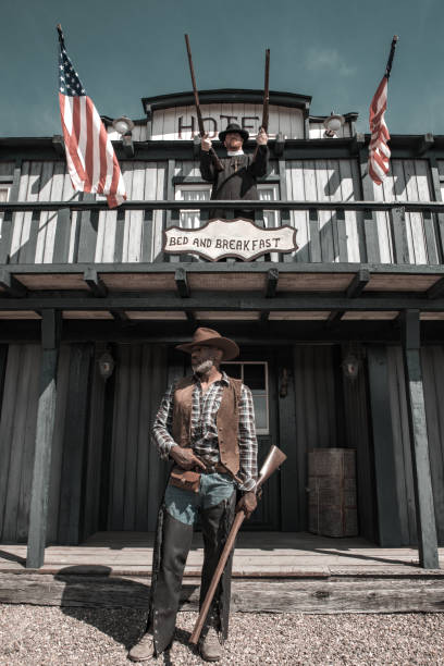 istock Handsome Black Cowboy in an authentic wild west setting 1501749214