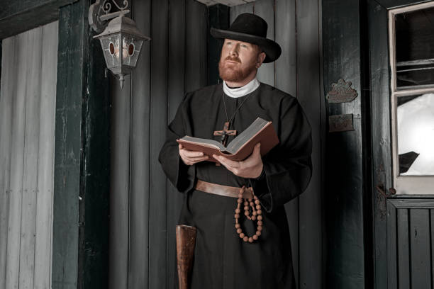 istock Handsome redhead Cowboy priest in an authentic wild west setting 1501749472