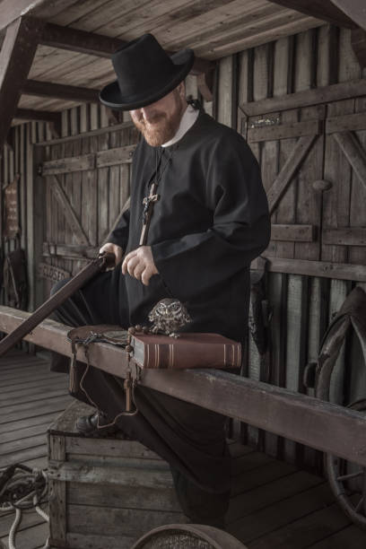 istock Handsome redhead Cowboy priest in an authentic wild west setting 1501749761