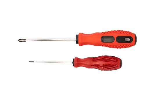 Red screwdriver isolated on white background. Tool.