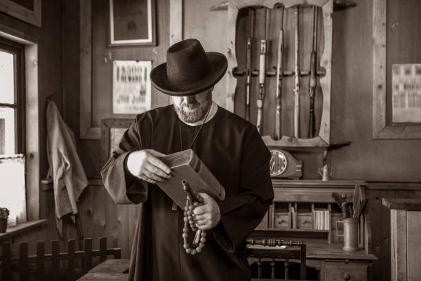 istock Handsome redhead Cowboy priest in an authentic wild west setting 1501751004
