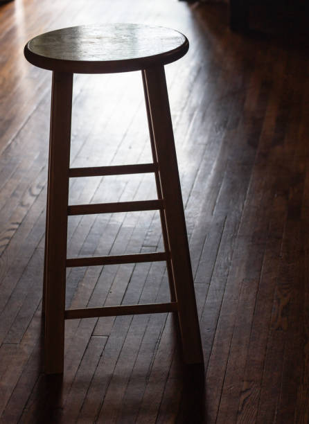 istock Morning sunlight on wooden floor and stool 1501755184