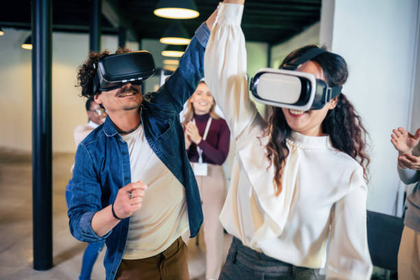 istock Business people making team training exercise during team building seminar using VR glasses 1501759654