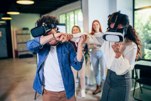 istock Business people making team training exercise during team building seminar using VR glasses 1501759666