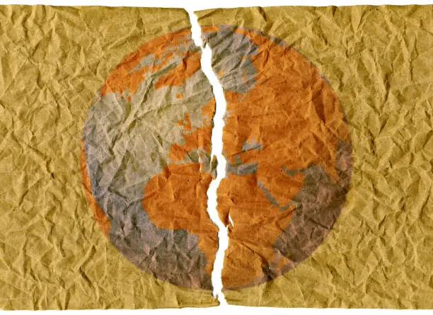 Background of crumpled paper with, torn sheet, planet Earth