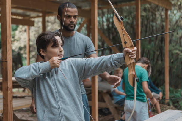 istock Archery fun for young children at a local range 1501762187