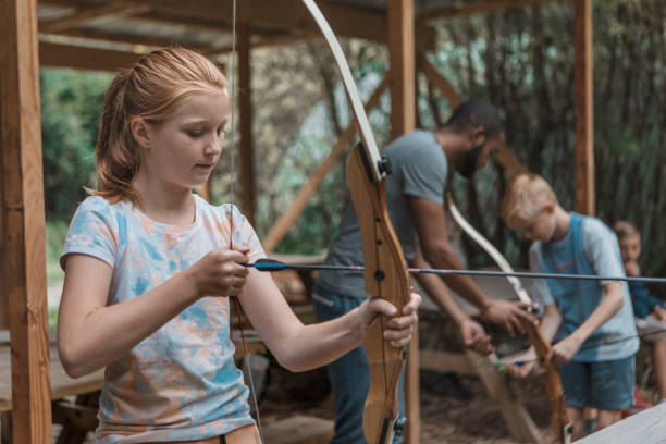 istock Archery fun for young children at a local range 1501762212