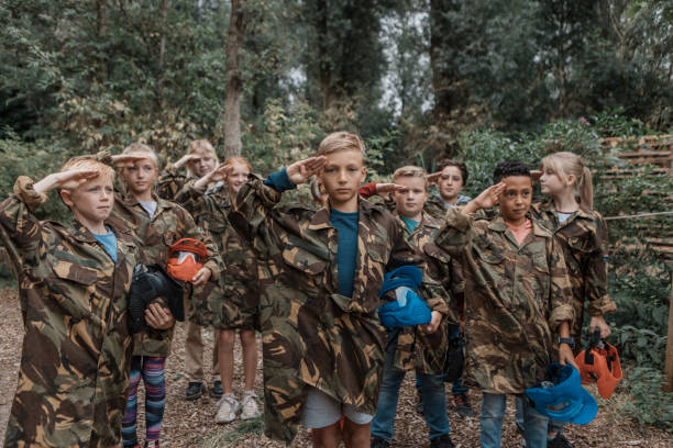 istock Paintball fun for group of children 1501762330
