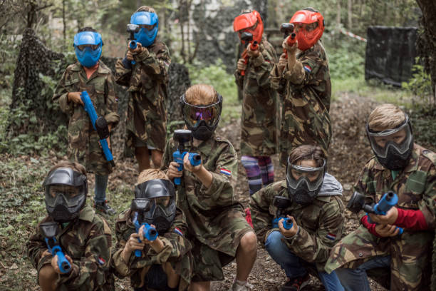 istock Paintball fun for group of children 1501762680