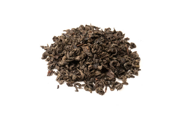 istock Dried tea leaves isolated on a white background. 1501765389