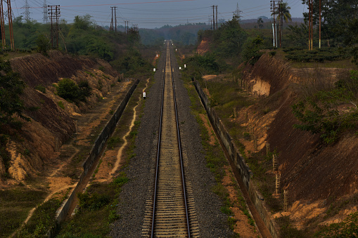 A railway tract in hill area in Tripura passing through a valley.